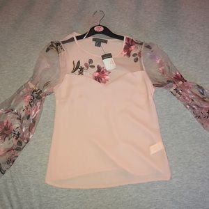 A pink and lace shirt